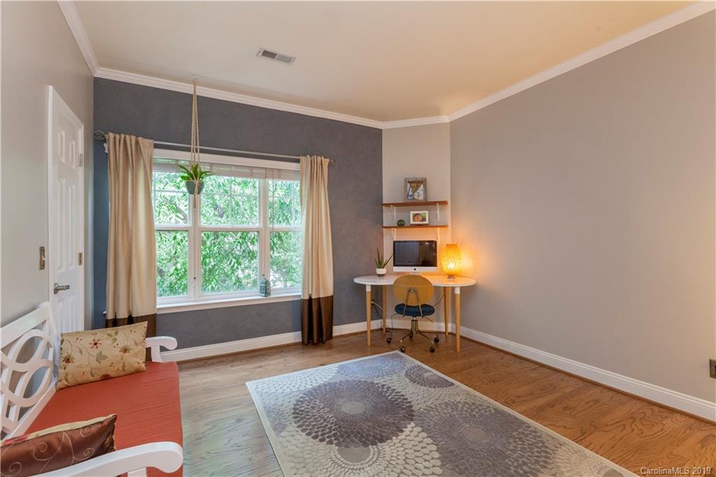 5730 Closeburn Road, Unit M Charlotte, NC 28210 - Photo 14 of 21 a living room with furniture and a window