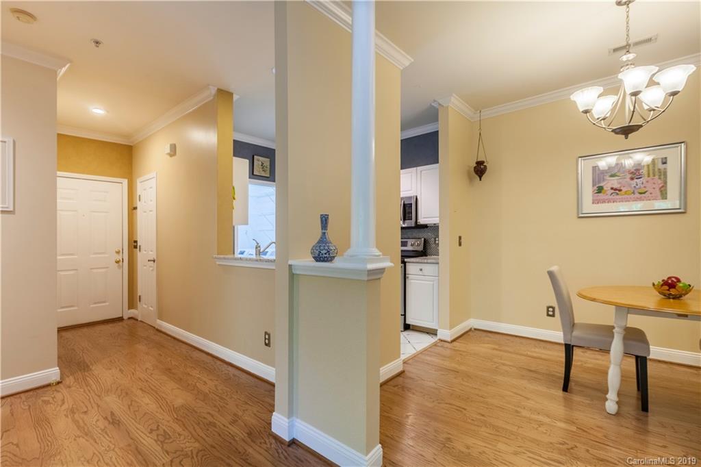 5730 Closeburn Road, Unit M Charlotte, NC 28210 - Photo 10 of 21 a view of a room with furniture and wooden floor
