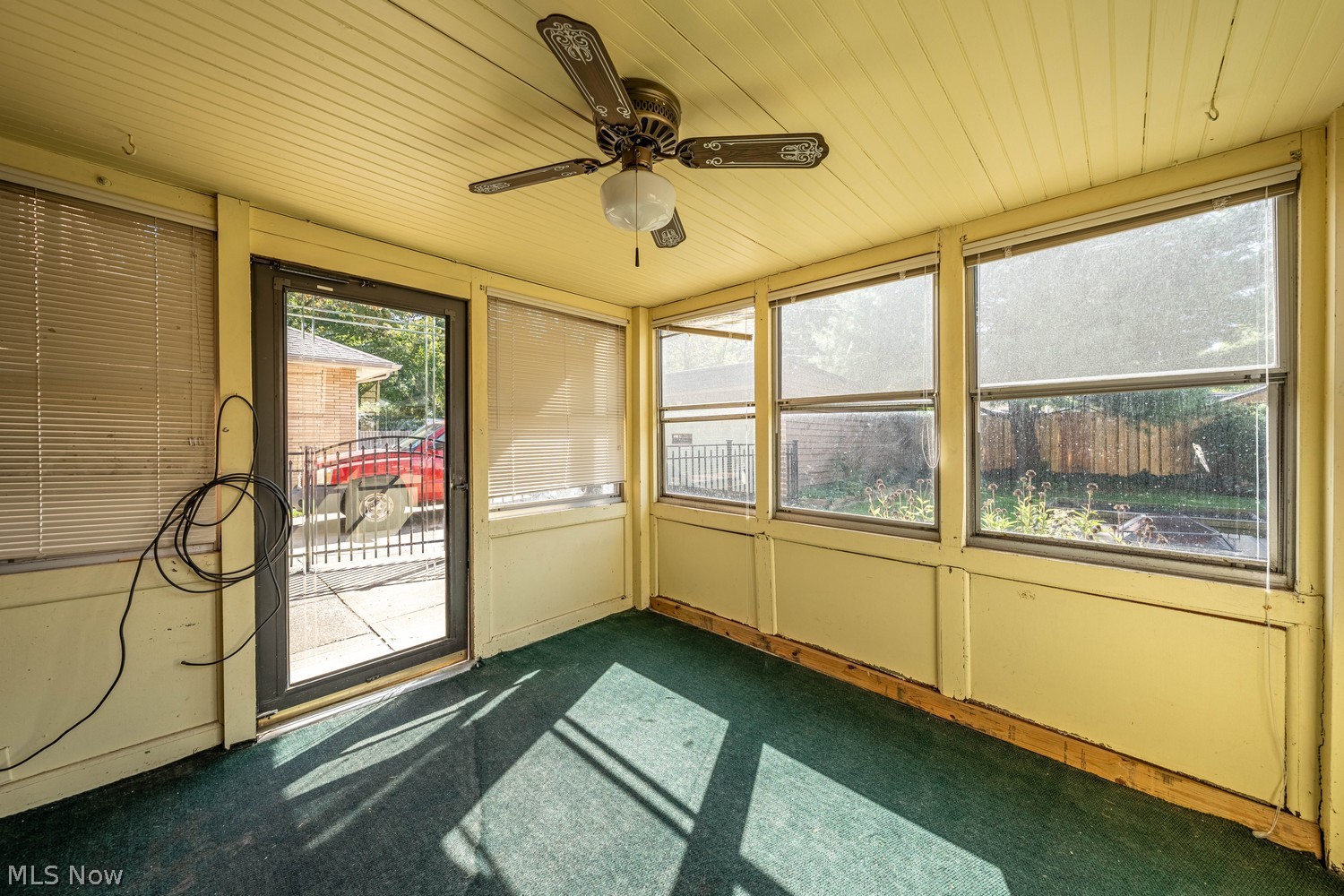 19675 Henry Road Cleveland, OH 44126 - Photo 35 of 42 Enclosed back porch overlooking backyard