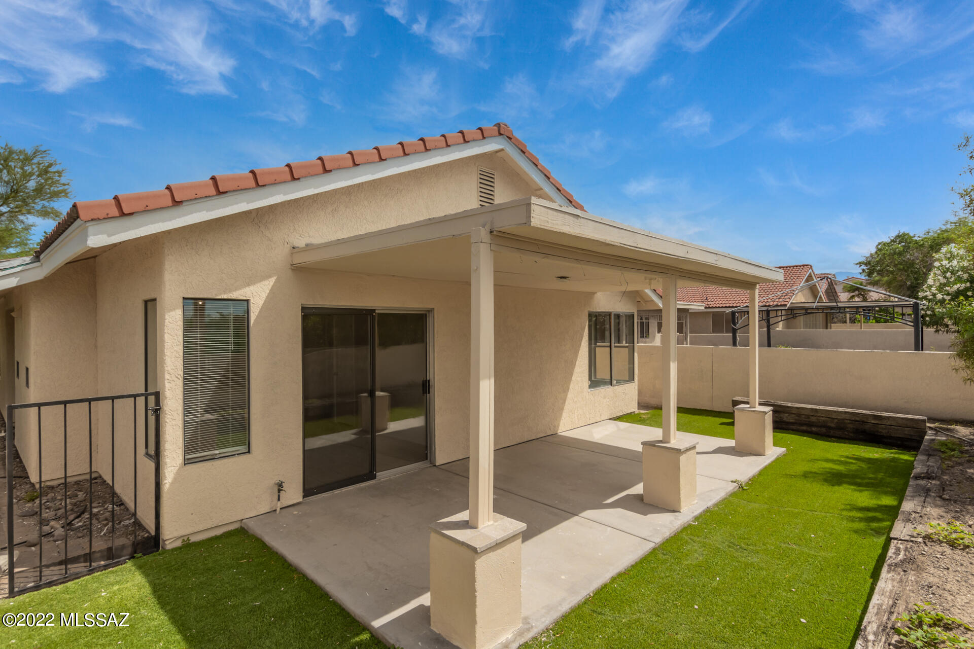 4697 West Weathervane Street Tucson, AZ 85741 - Photo 25 of 25 a front view of a house with a yard