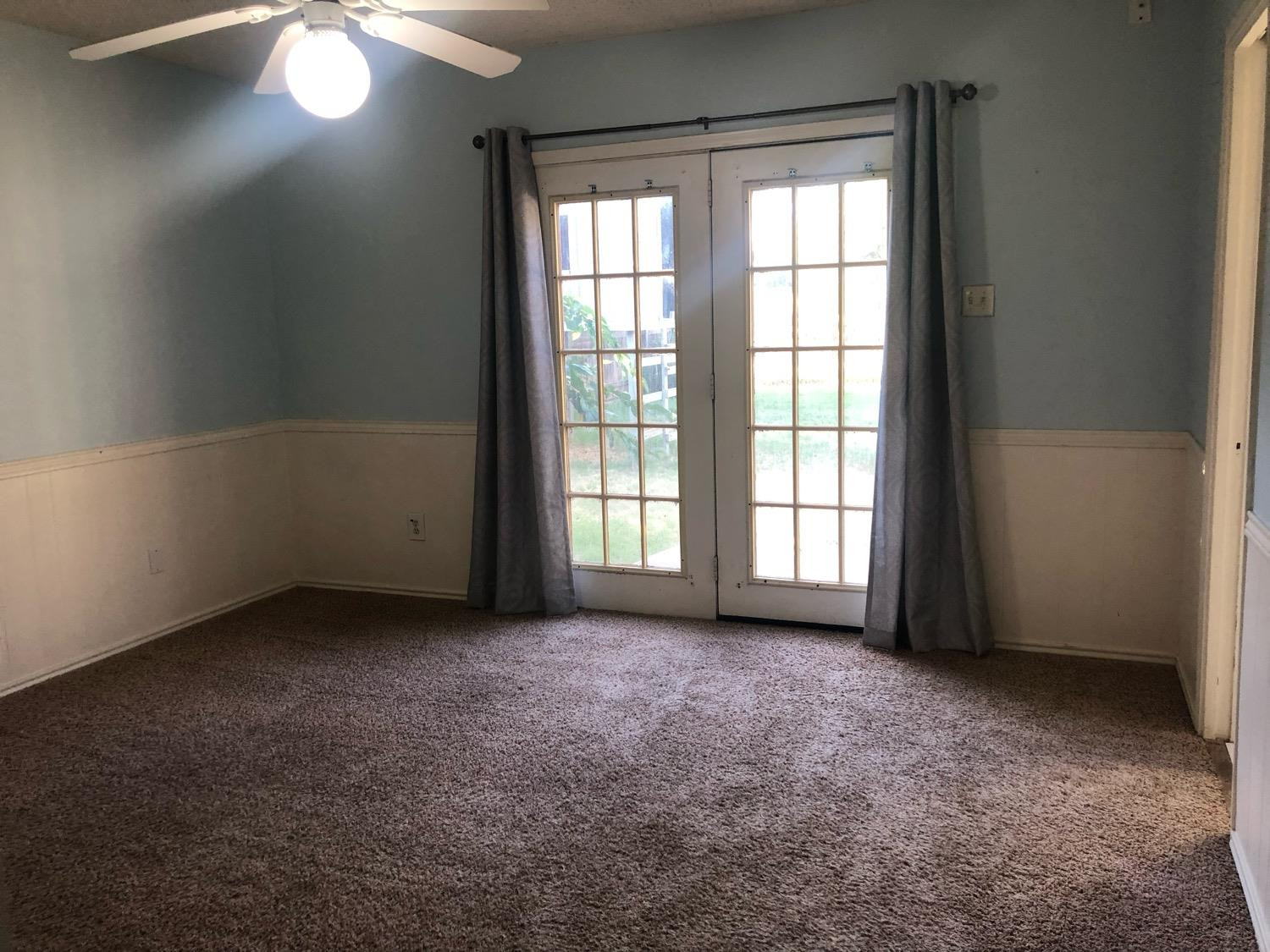 2904 20th Street Lubbock, TX 79410 - Photo 24 of 35 wooden floor and window in an empty room