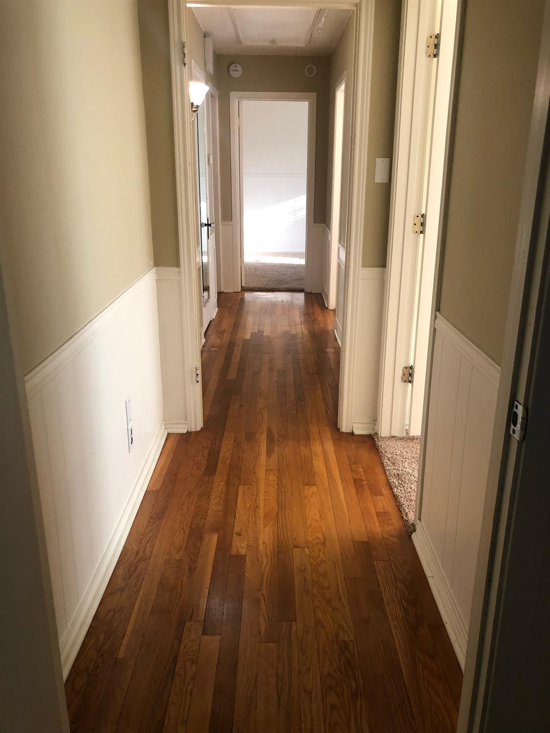 2904 20th Street Lubbock, TX 79410 - Photo 28 of 35 a view of a hallway with wooden floor
