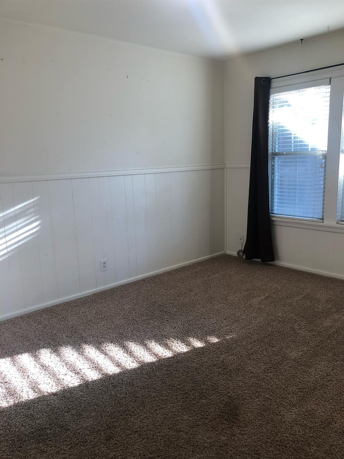 2904 20th Street Lubbock, TX 79410 - Photo 29 of 35 a view of a window in an empty room