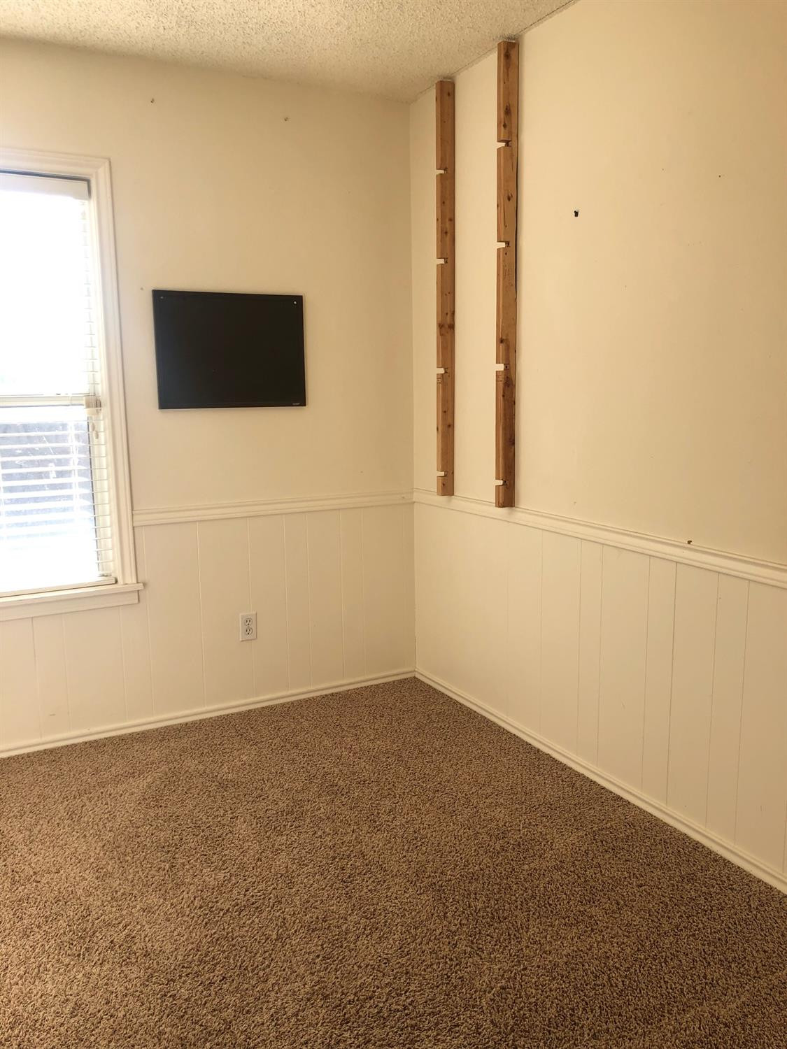2904 20th Street Lubbock, TX 79410 - Photo 32 of 35 a view of an empty room with a window