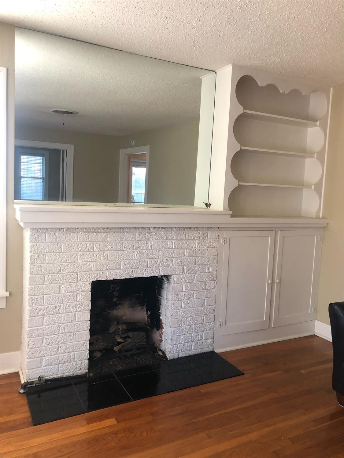 2904 20th Street Lubbock, TX 79410 - Photo 6 of 35 a living room with furniture and a fireplace