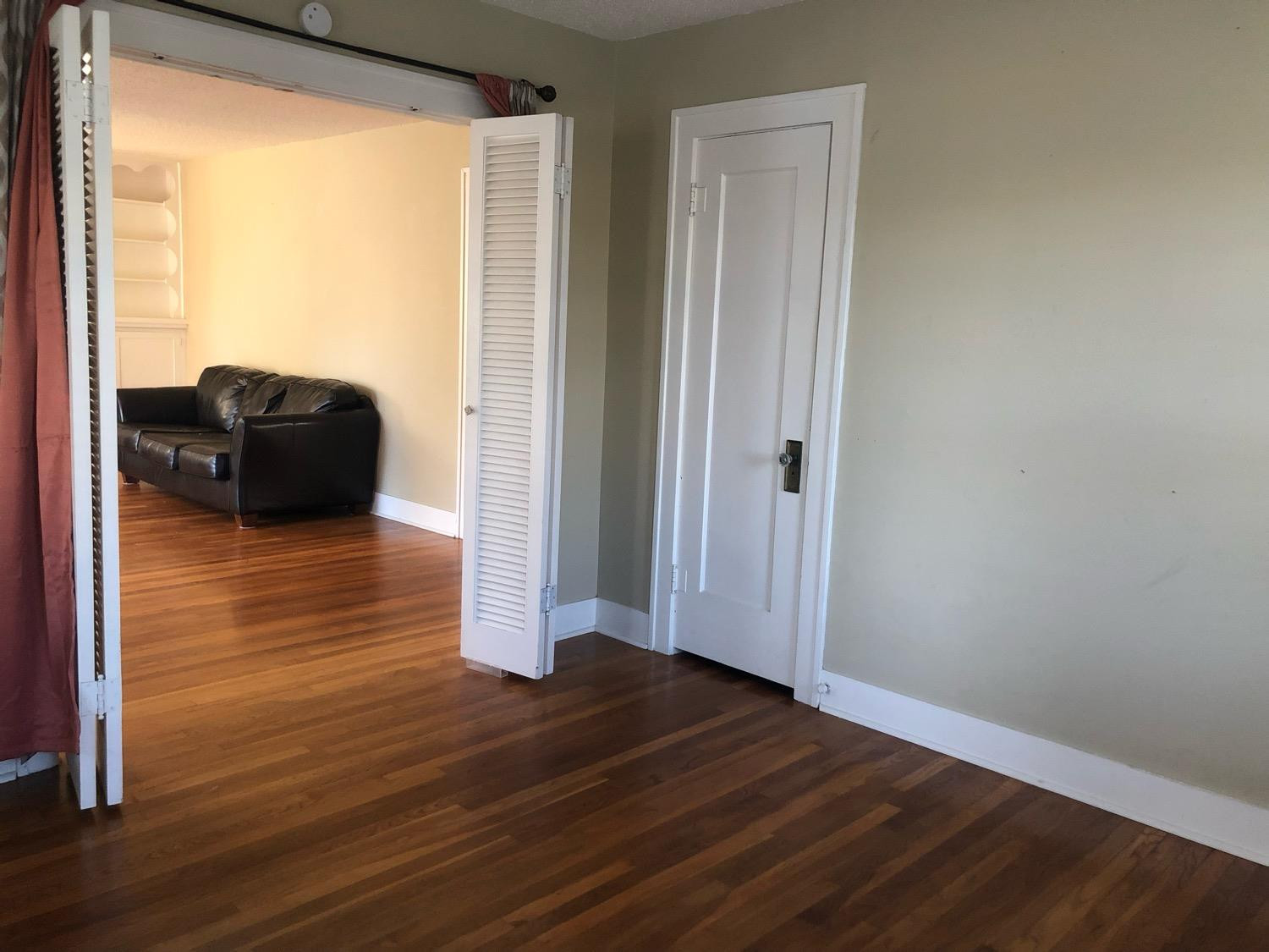 2904 20th Street Lubbock, TX 79410 - Photo 10 of 35 a view of a room with wooden floor and furniture