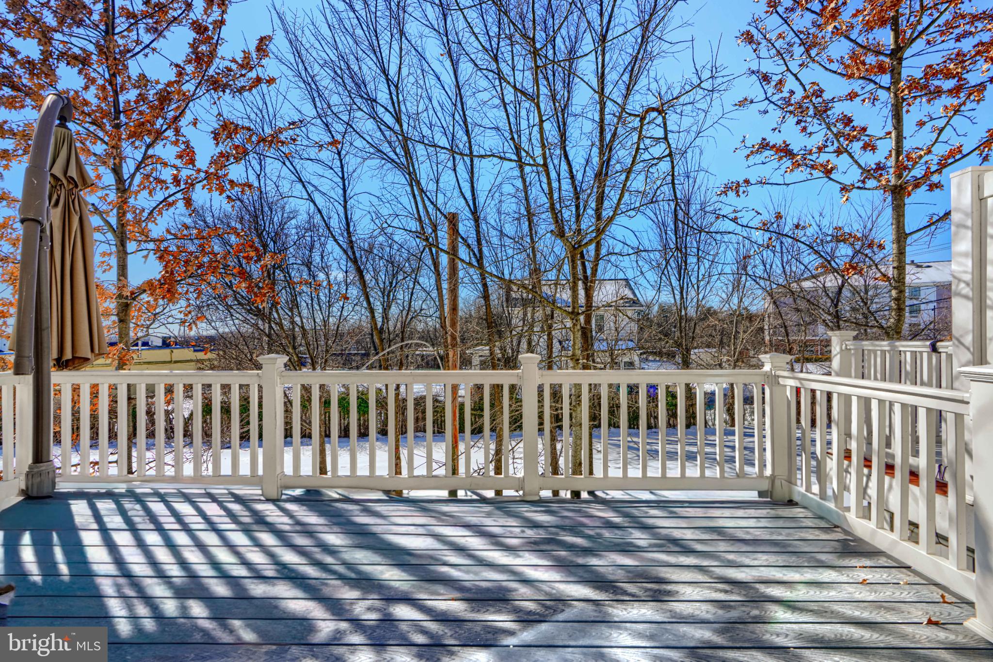 7366 Matchbox Alley Elkridge, MD 21075 - Photo 15 of 32 a view of a wooden roof deck