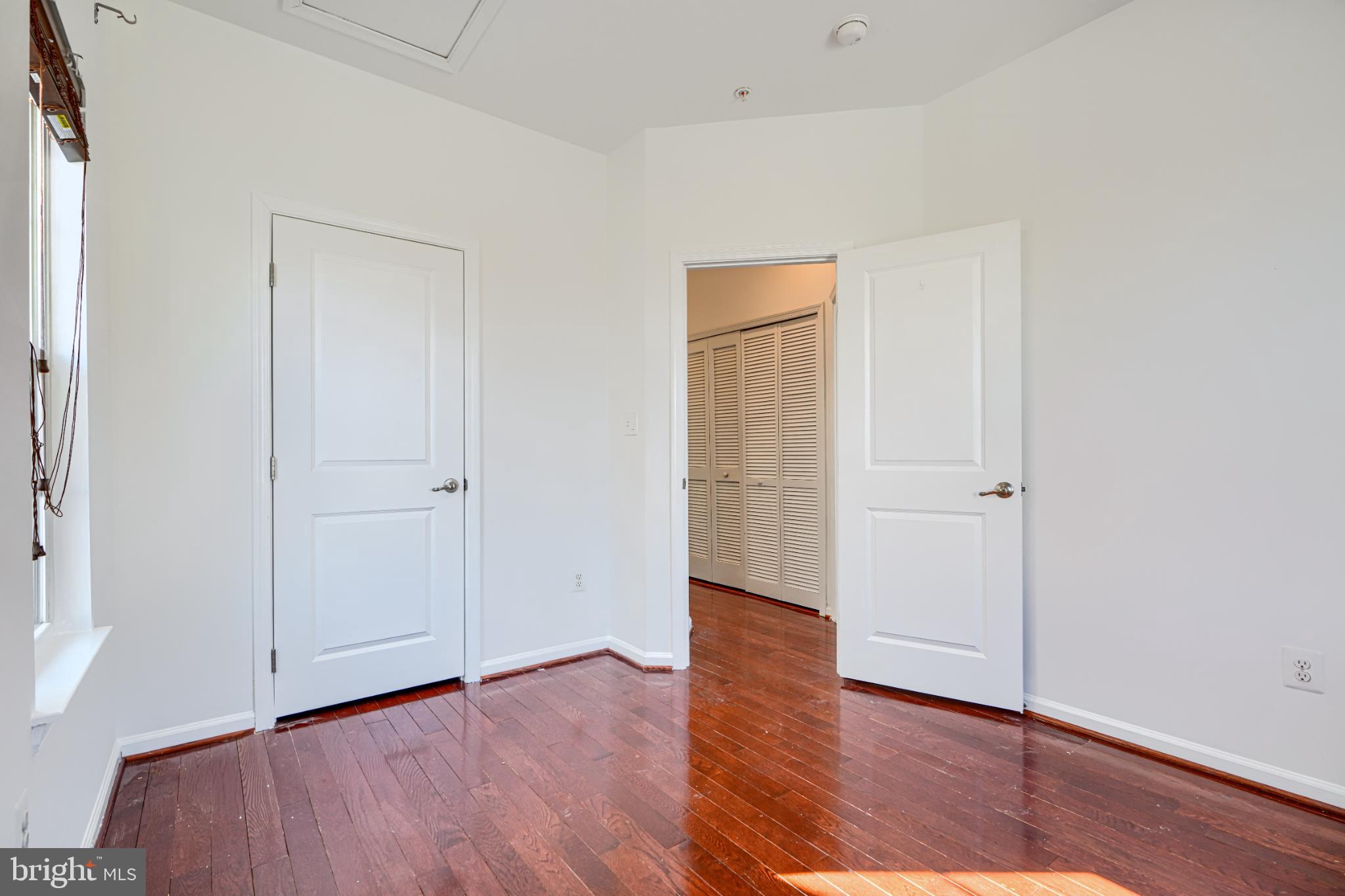 7366 Matchbox Alley Elkridge, MD 21075 - Photo 30 of 32 a view of empty room with wooden floor