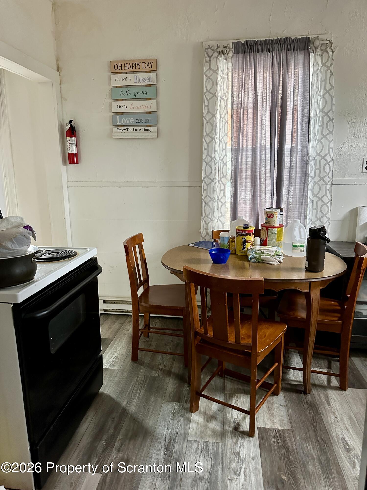 1129-1131 Hampton Street Scranton, PA 18504 - Photo 19 of 45 a dining room with furniture and window