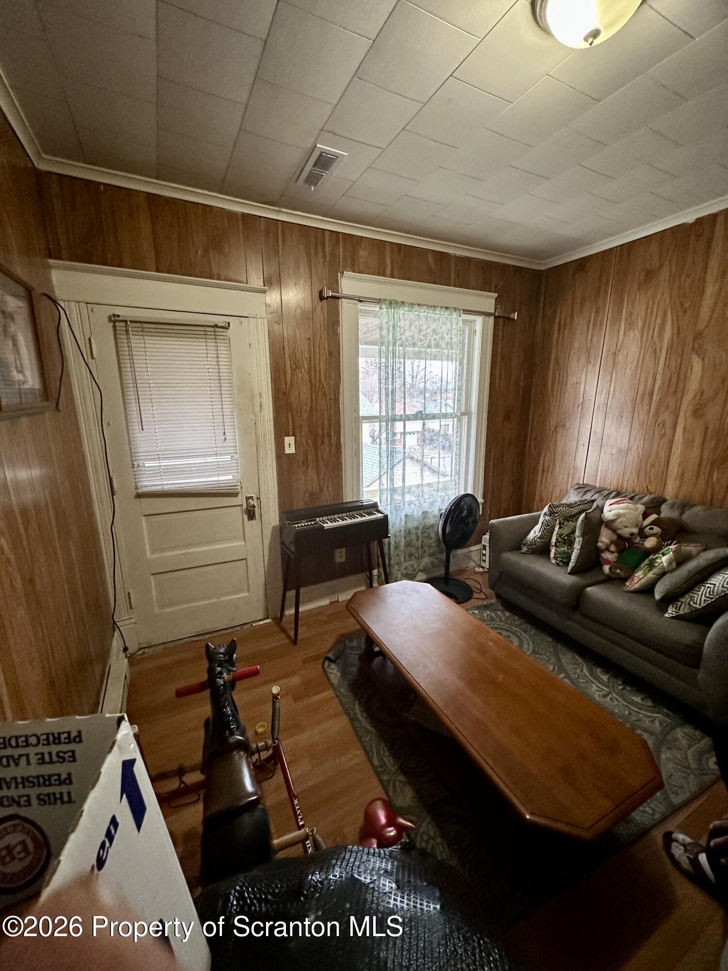1129-1131 Hampton Street Scranton, PA 18504 - Photo 21 of 45 a kitchen with stainless steel appliances kitchen island granite countertop a stove a sink and a refrigerator