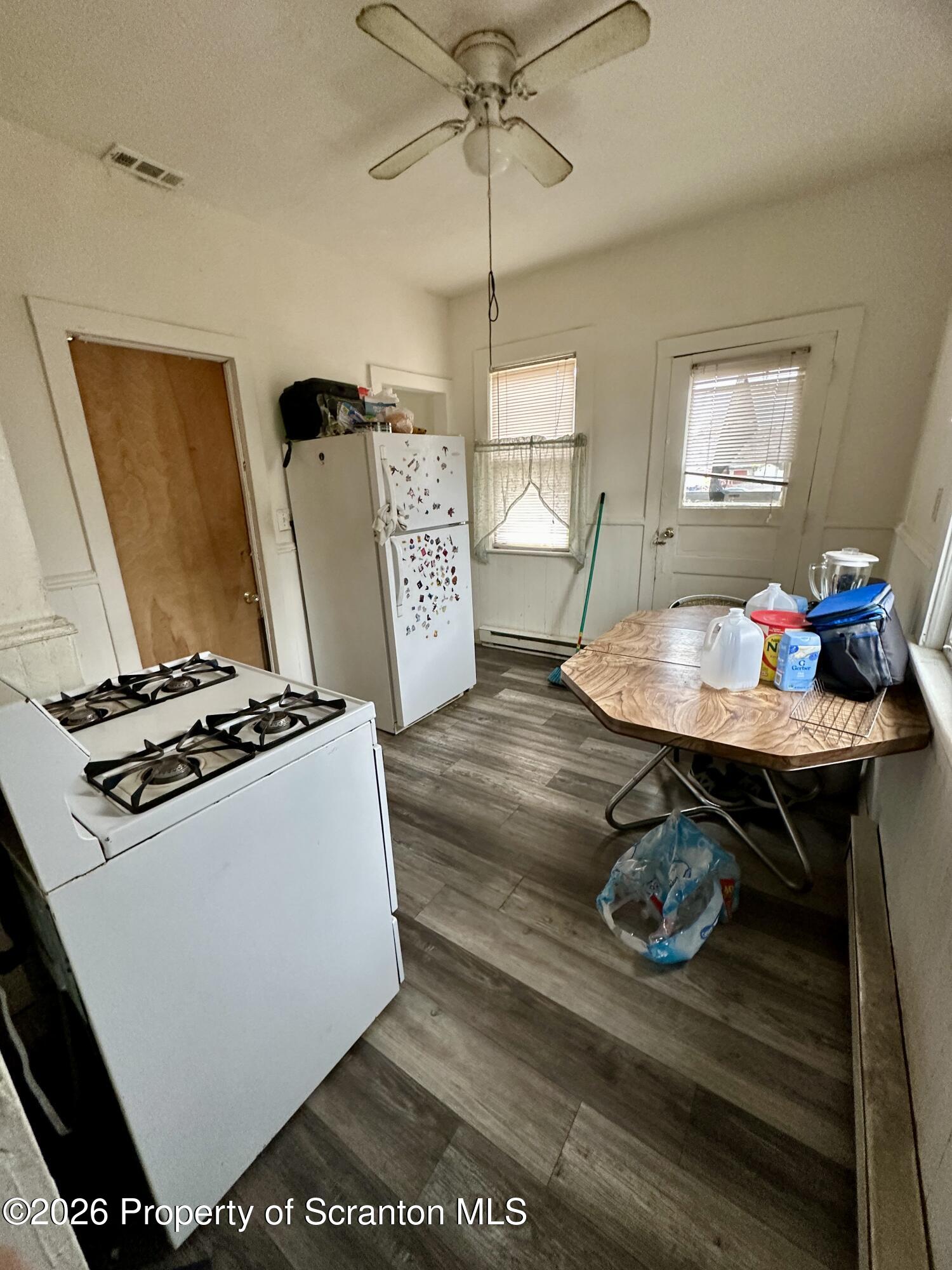 1129-1131 Hampton Street Scranton, PA 18504 - Photo 24 of 45 a living room with furniture and wooden floor