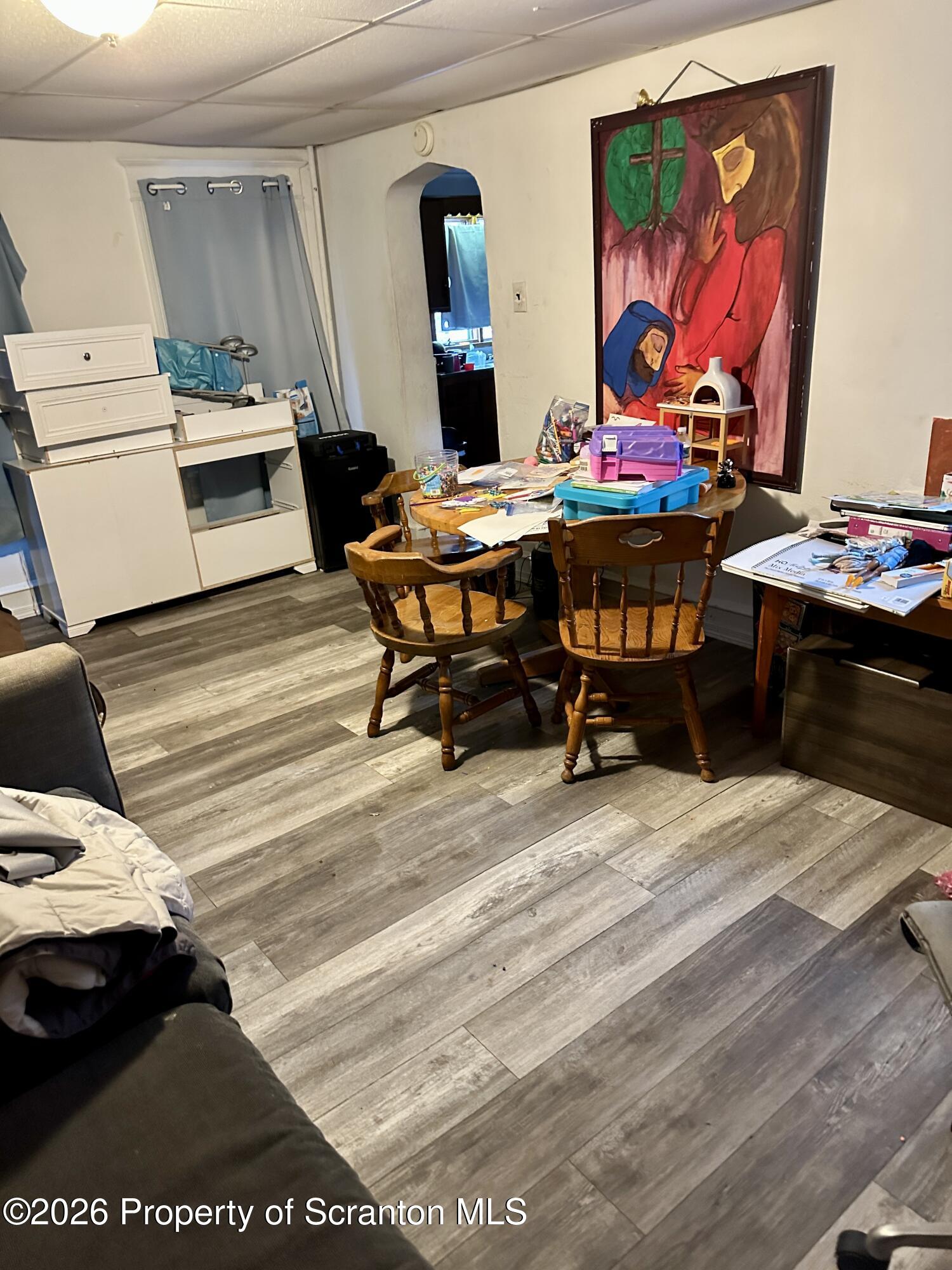 1129-1131 Hampton Street Scranton, PA 18504 - Photo 44 of 45 a living room with furniture and wooden floor