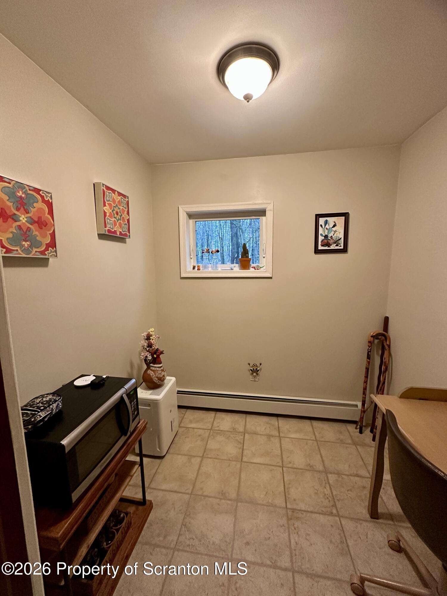 1129-1131 Hampton Street Scranton, PA 18504 - Photo 9 of 45 a room with storage and utility