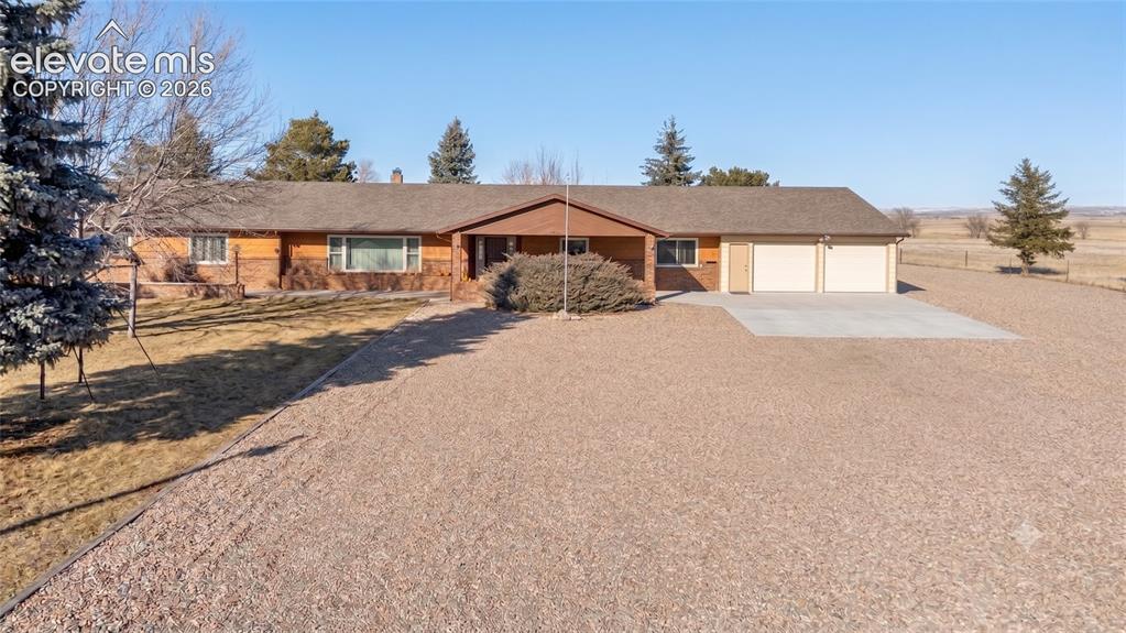 24760 Jones Road Calhan, CO 80808 - Photo 19 of 20 Front of home with covered front porch