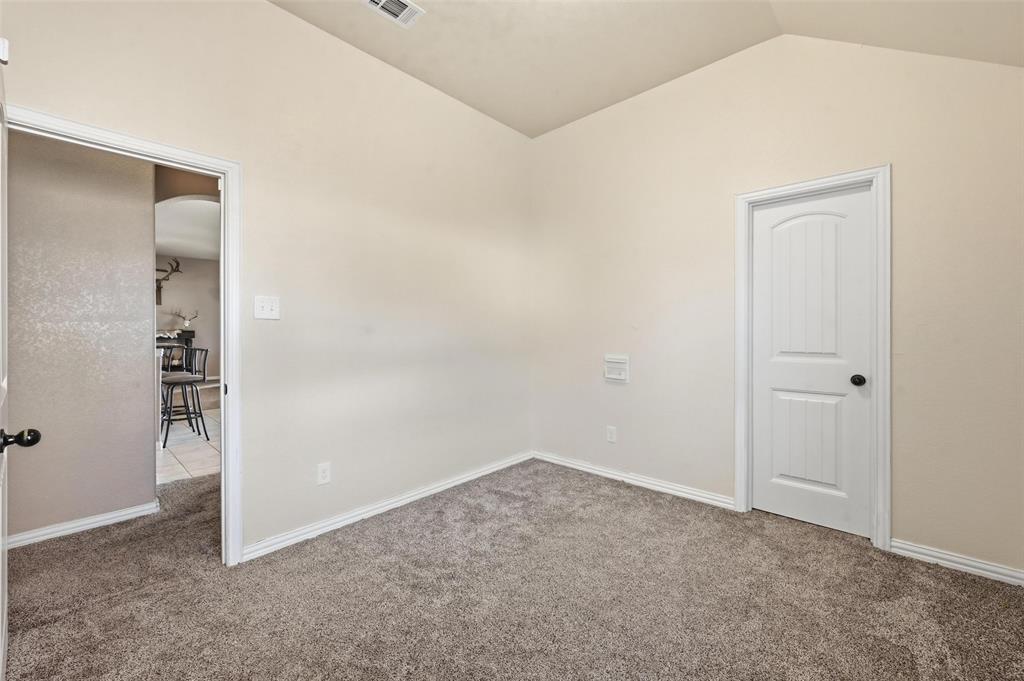 144 Brady Coleman Lane Springtown, TX 76082 - Photo 24 of 37 an empty room with shelves