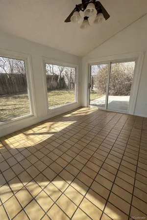 a view of an empty room and window
