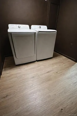 a utility room with washer and dryer