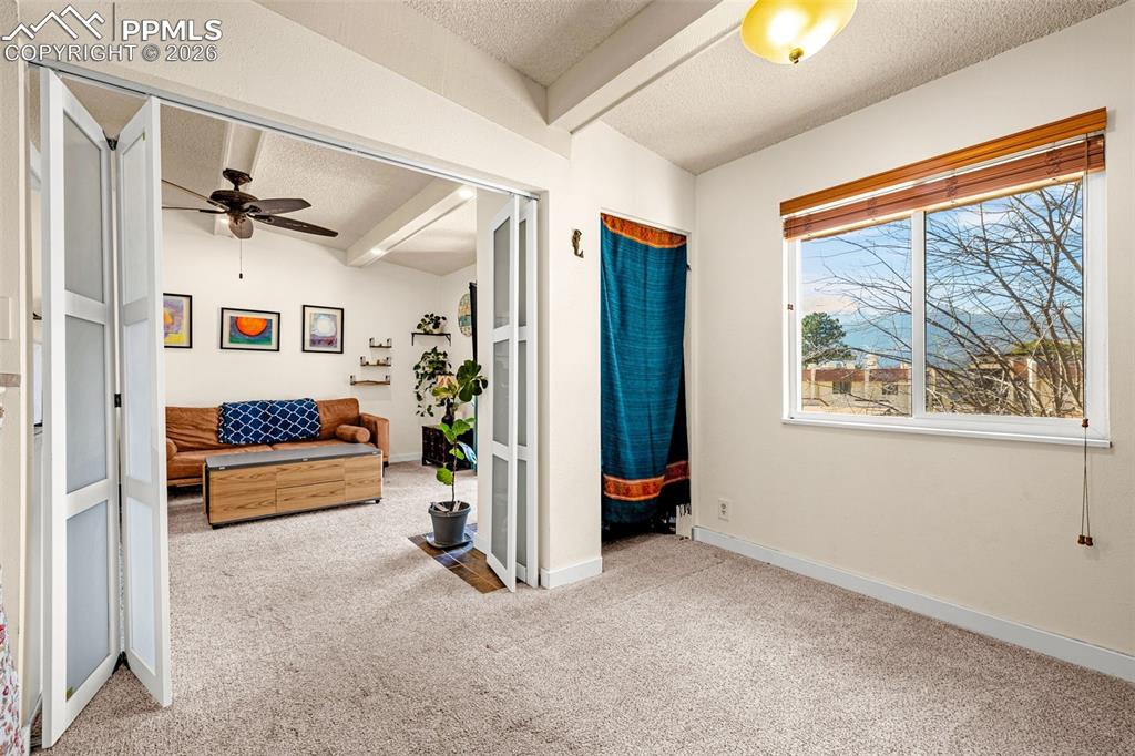1018 Fontmore Road, Unit C Colorado Springs, CO 80904 - Photo 3 of 33 a view of hallway with furniture and windows