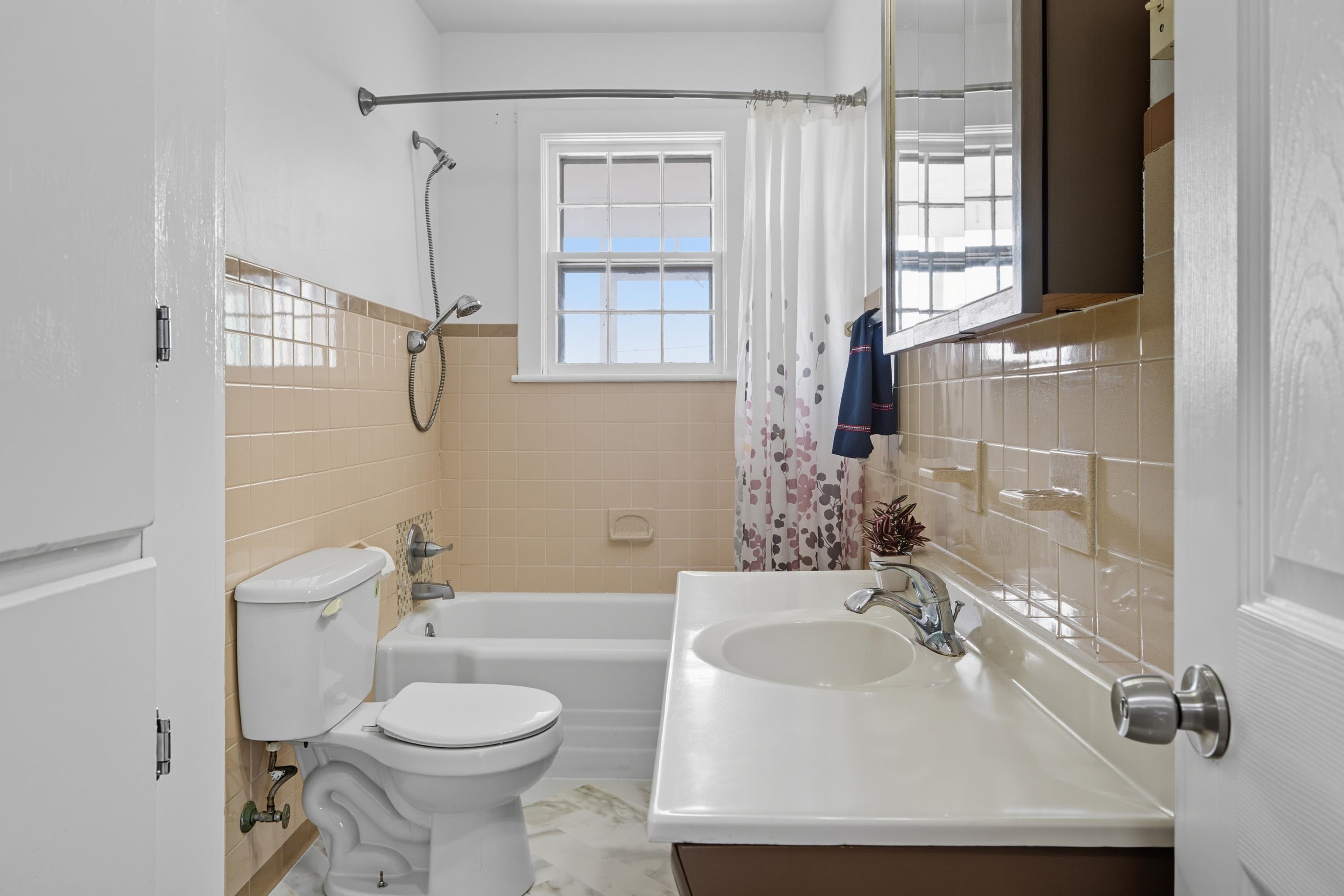 3138 Cross Keys Road Harrisonburg, VA 22801 - Photo 38 of 74 This full bathroom offers a wooden vanity with storage and full bathtub/shower combination.