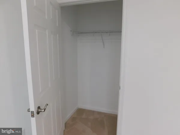 a bathroom with a sink a shower and a mirror