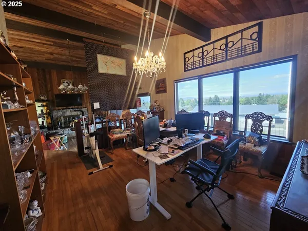 a view of a dining room with furniture window and outside view