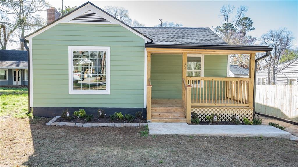 a front view of a house with a porch