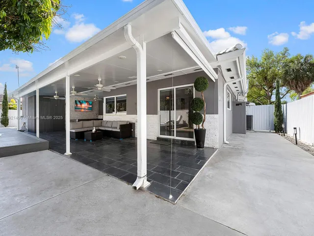 a view of house with outdoor space and entertaining space