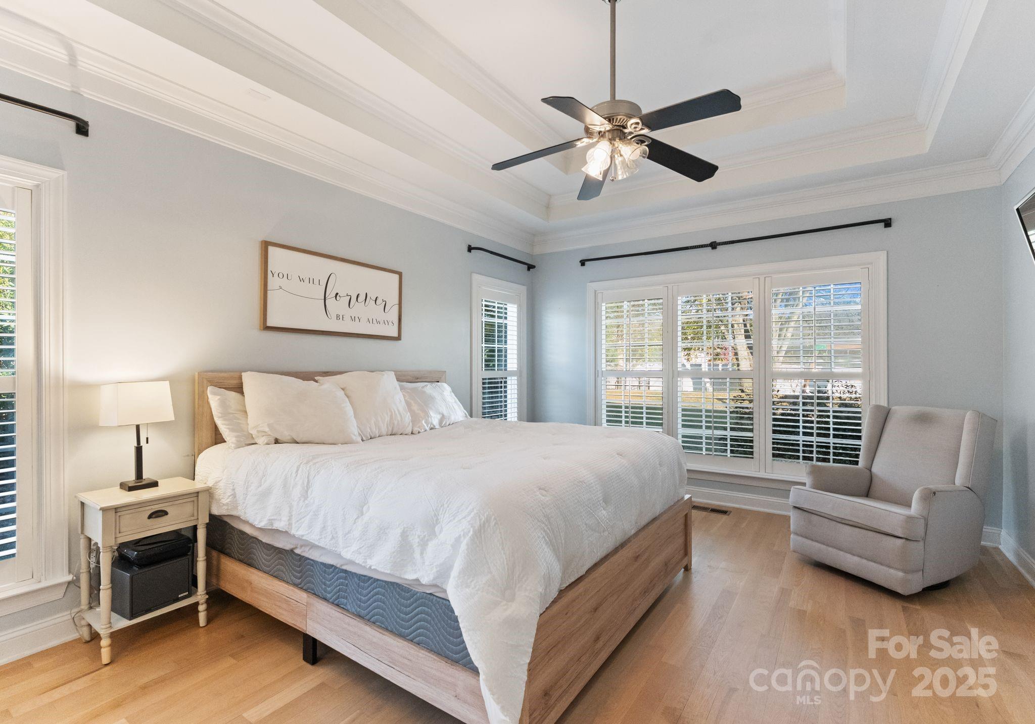 706 King Fredrick Lane Southwest Concord, NC 28027 - Photo 17 of 36 a bedroom with a bed and a couch