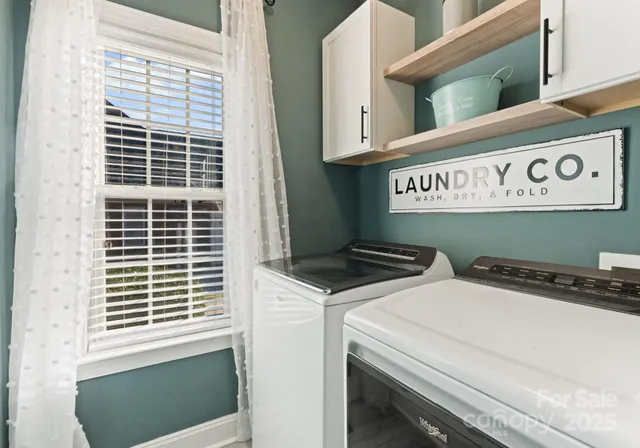 a utility room with dryer and washer