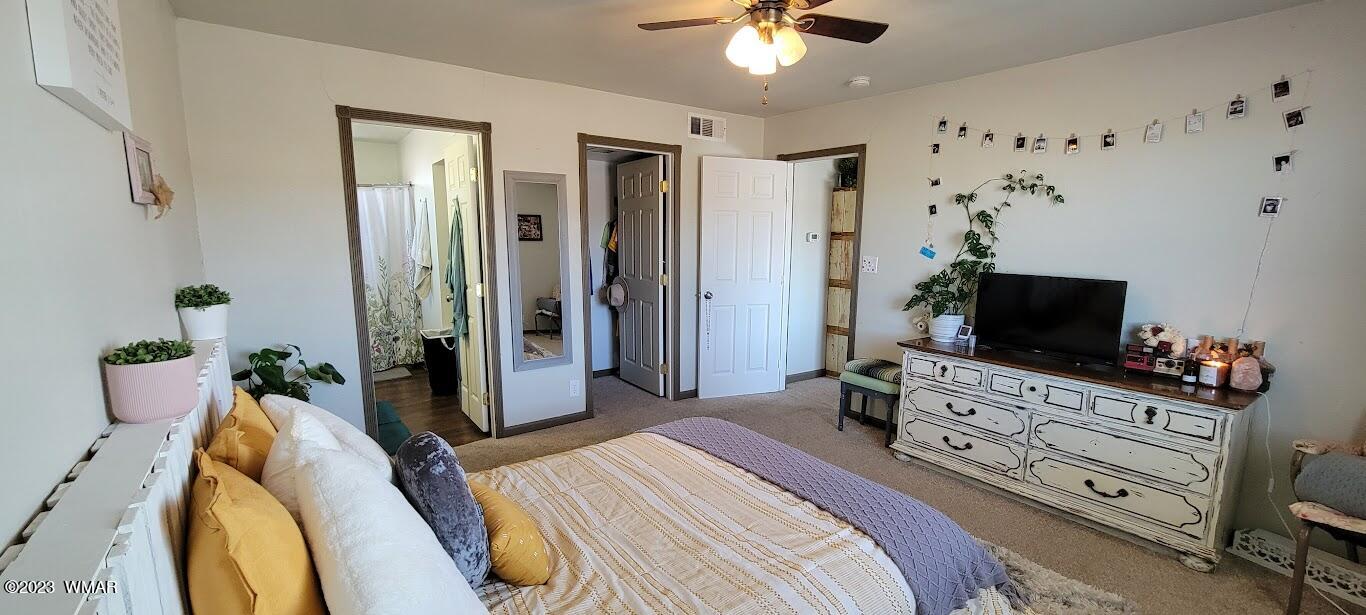 741 South 7th W Street Snowflake, AZ 85937 - Photo 14 of 41 a bedroom with a bed and furniture