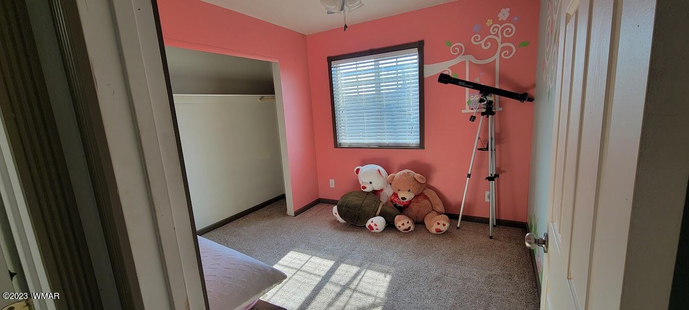 741 South 7th W Street Snowflake, AZ 85937 - Photo 20 of 41 a view of livingroom with furniture and windows