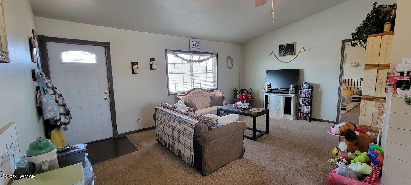 741 South 7th W Street Snowflake, AZ 85937 - Photo 2 of 41 a living room with furniture and a window