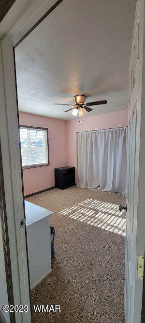 741 South 7th W Street Snowflake, AZ 85937 - Photo 23 of 41 a view of room with window and refrigerator