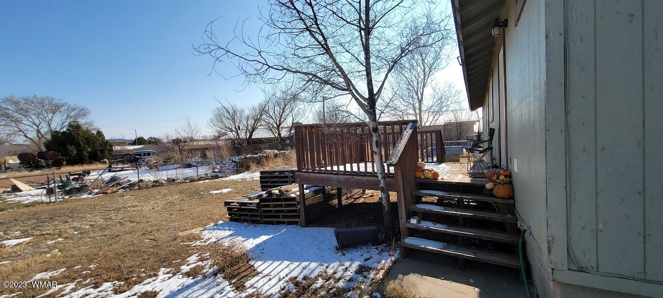 741 South 7th W Street Snowflake, AZ 85937 - Photo 24 of 41 a view of balcony with wooden floor and outdoor seating
