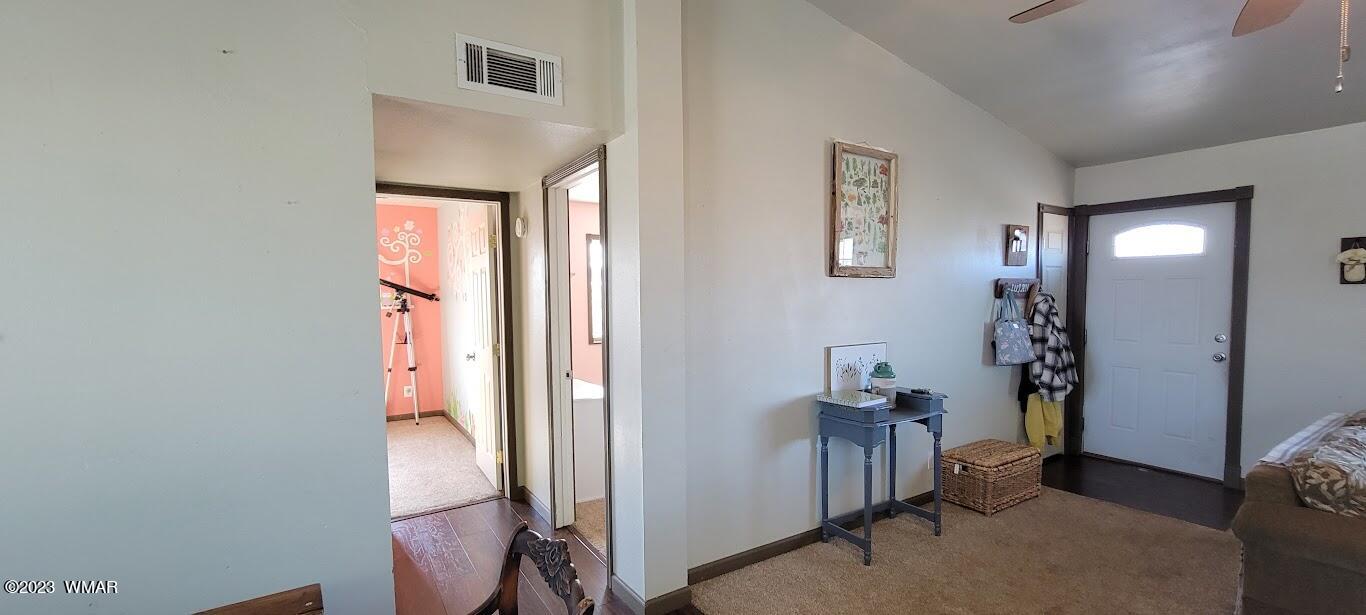 741 South 7th W Street Snowflake, AZ 85937 - Photo 4 of 41 a view of a hallway with front door