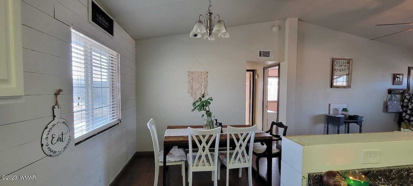 741 South 7th W Street Snowflake, AZ 85937 - Photo 7 of 41 a view of a dining room with furniture window and wooden floor