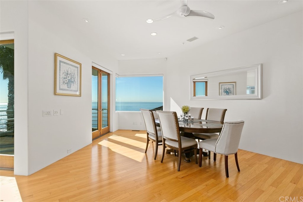2485 Kilo Way Laguna Beach, CA 92651 - Photo 11 of 35 a view of a dining room with furniture and wooden floor