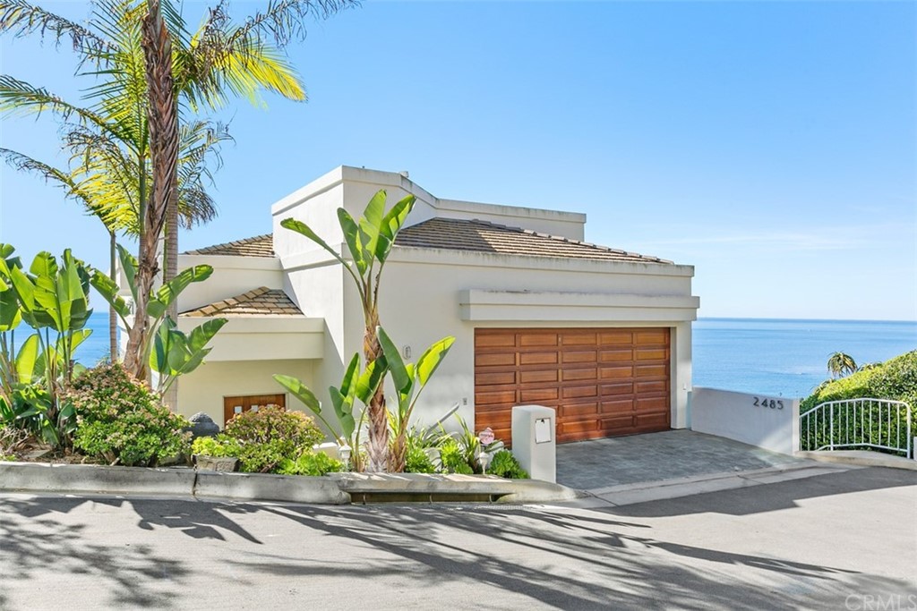 2485 Kilo Way Laguna Beach, CA 92651 - Photo 3 of 35 a front view of a house with garden