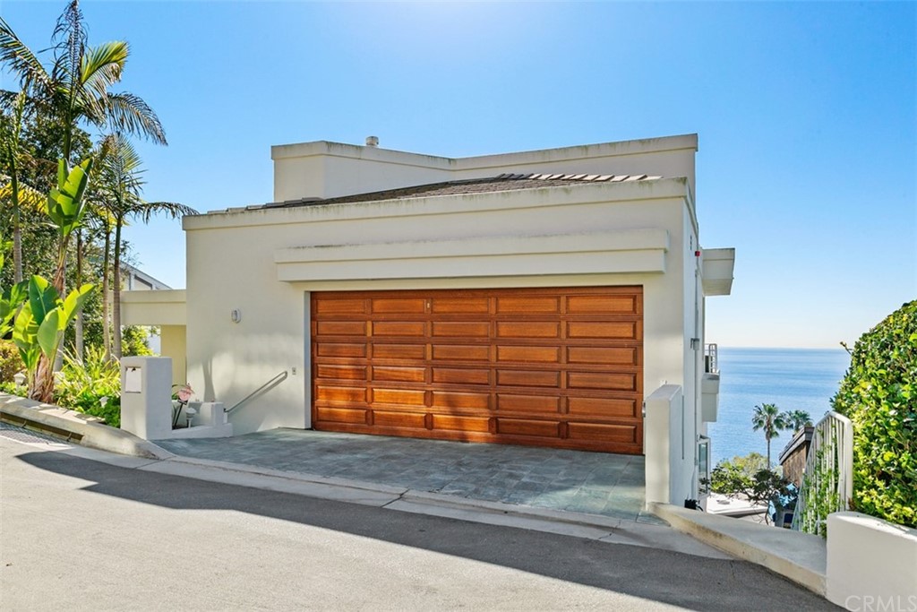 2485 Kilo Way Laguna Beach, CA 92651 - Photo 32 of 35 a front view of a house with a garage