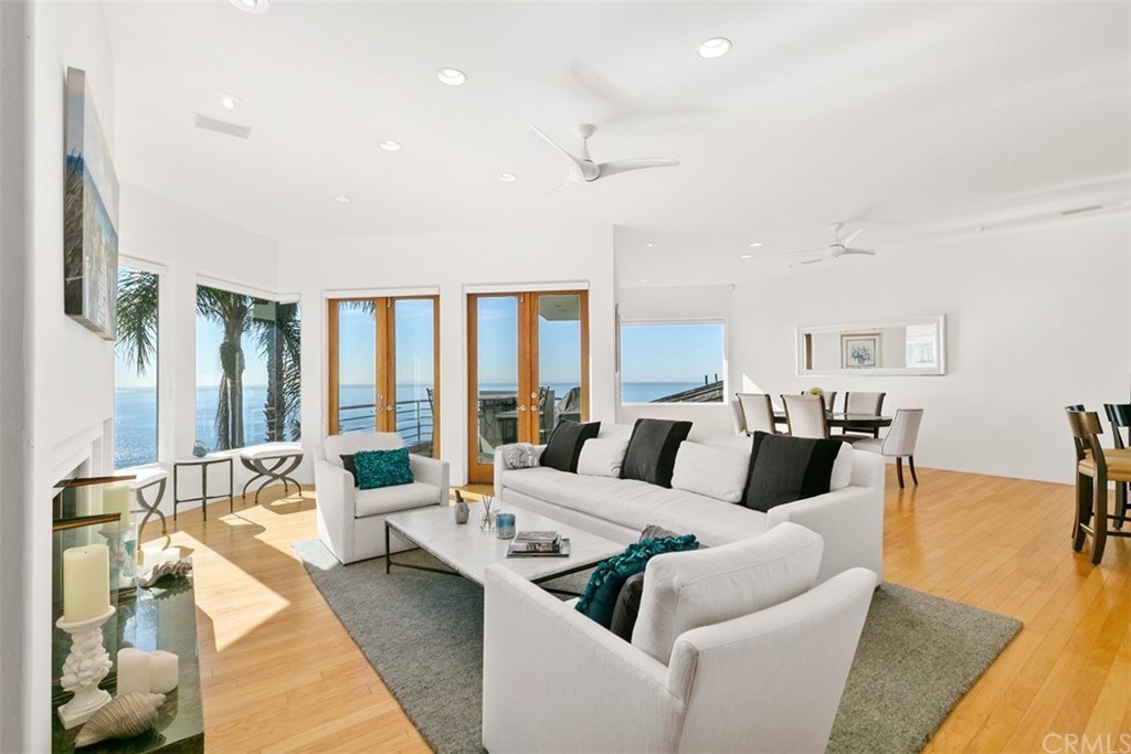 2485 Kilo Way Laguna Beach, CA 92651 - Photo 8 of 35 a living room with furniture wooden floor and a rug
