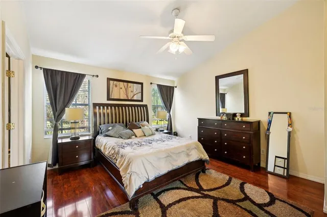 a bathroom with a sink mirror toilet and bathtub