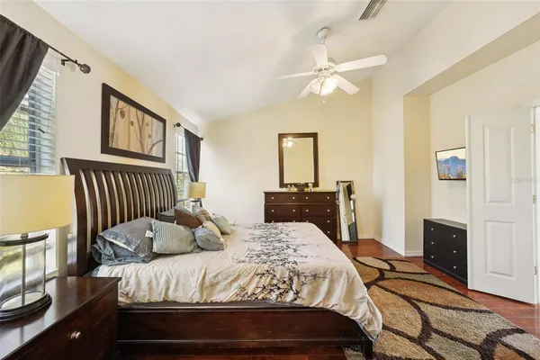 a view of a swimming pool with a garden and plants