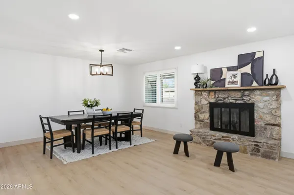 a view of a livingroom with furniture and a fireplace