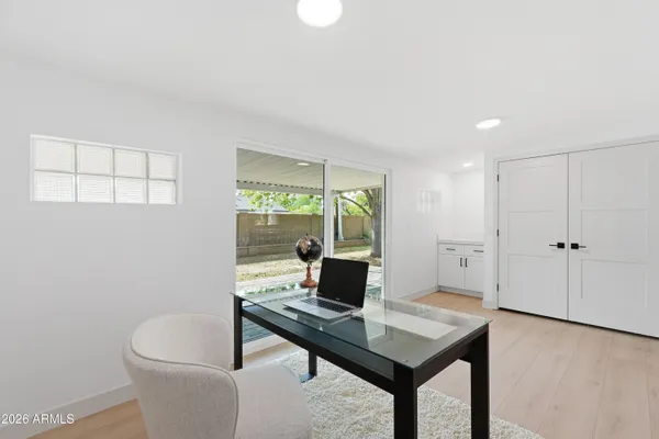 a living room with furniture and window