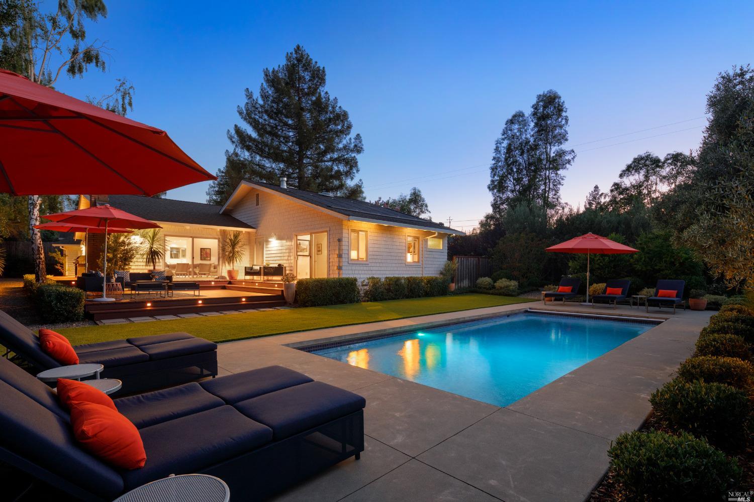 a view of swimming pool with patio