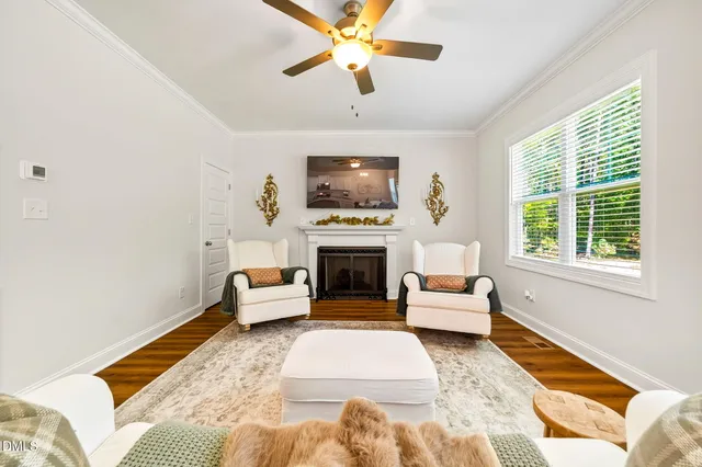 a living room with a couch and a fireplace