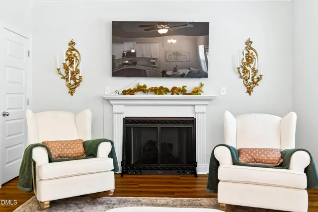 a living room with furniture and a table