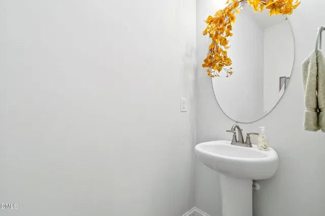 a bedroom with a bed a couch and dresser