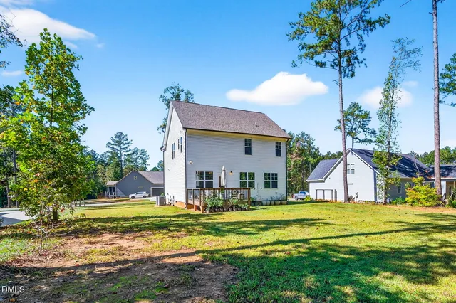 a view of a big yard with swimming pool