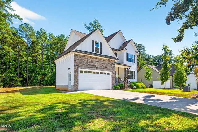 a view of a house with a swimming pool
